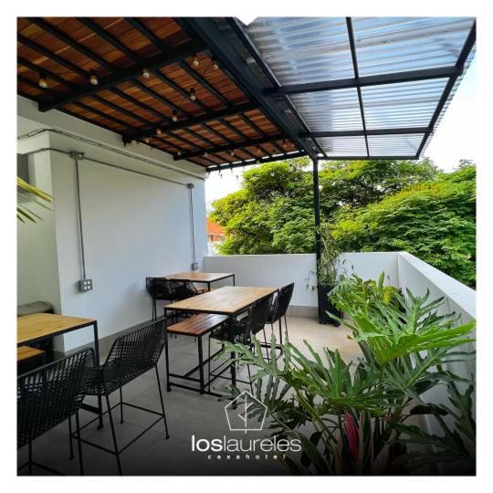 Casa Hotel Los Laureles Medellin Bagian luar foto